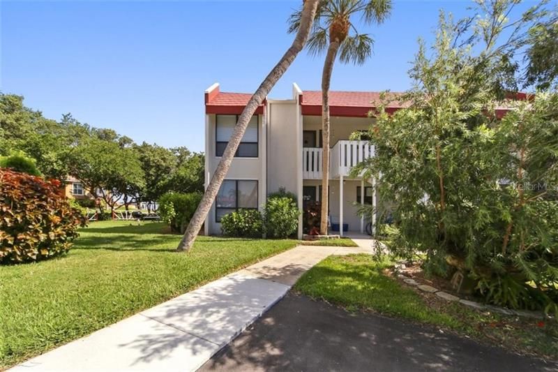 Second floor unit on the end for privacy and directly next to grilling area and kayak launch on the bay.