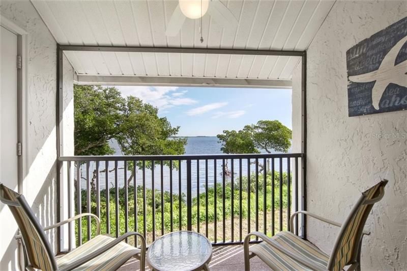 Your own private lanai on this end unit second floor condo offering beautiful vistas of Anna Maria Sound framed by the mangroves.  A storage closet is on the left.