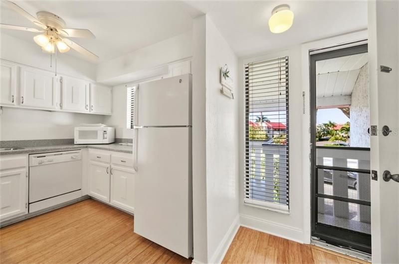 Bright, white kitchen and loads of natural light.