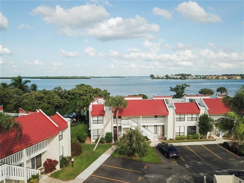 Second floor condo, end unit, directly on Anna Maria Sound with direct bay views!