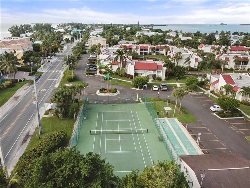 Tennis or pickleball anyone?  The private court at Runaway Bay.