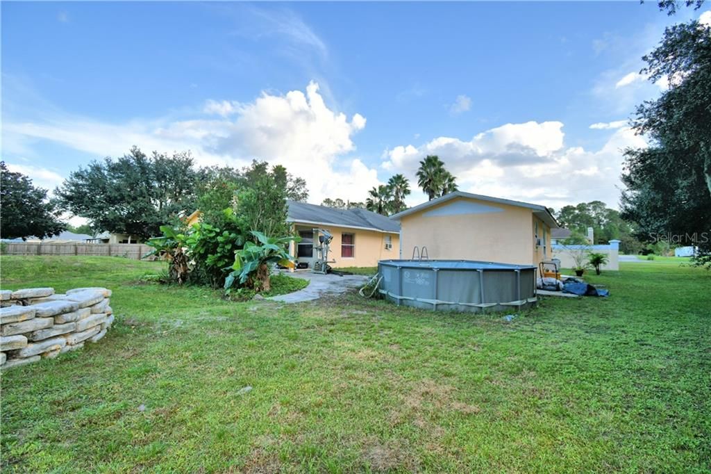 Pool, guest house and side of house