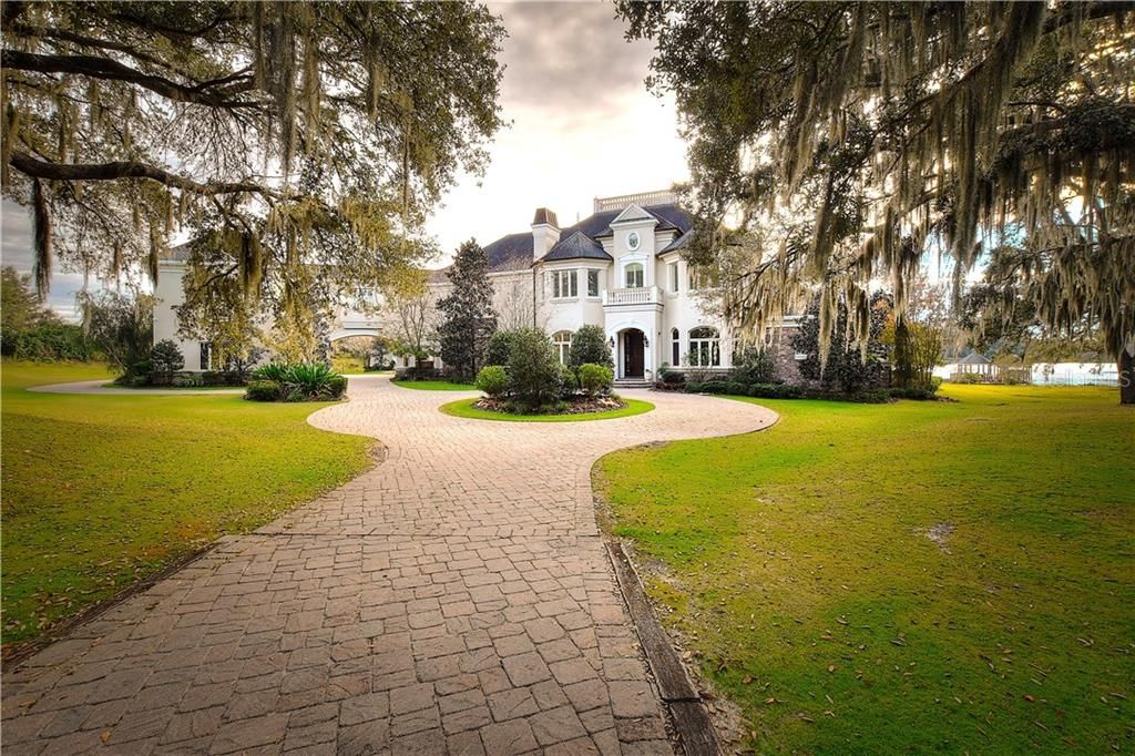 Spectacular French country estate on 9+ acres and a private lake.