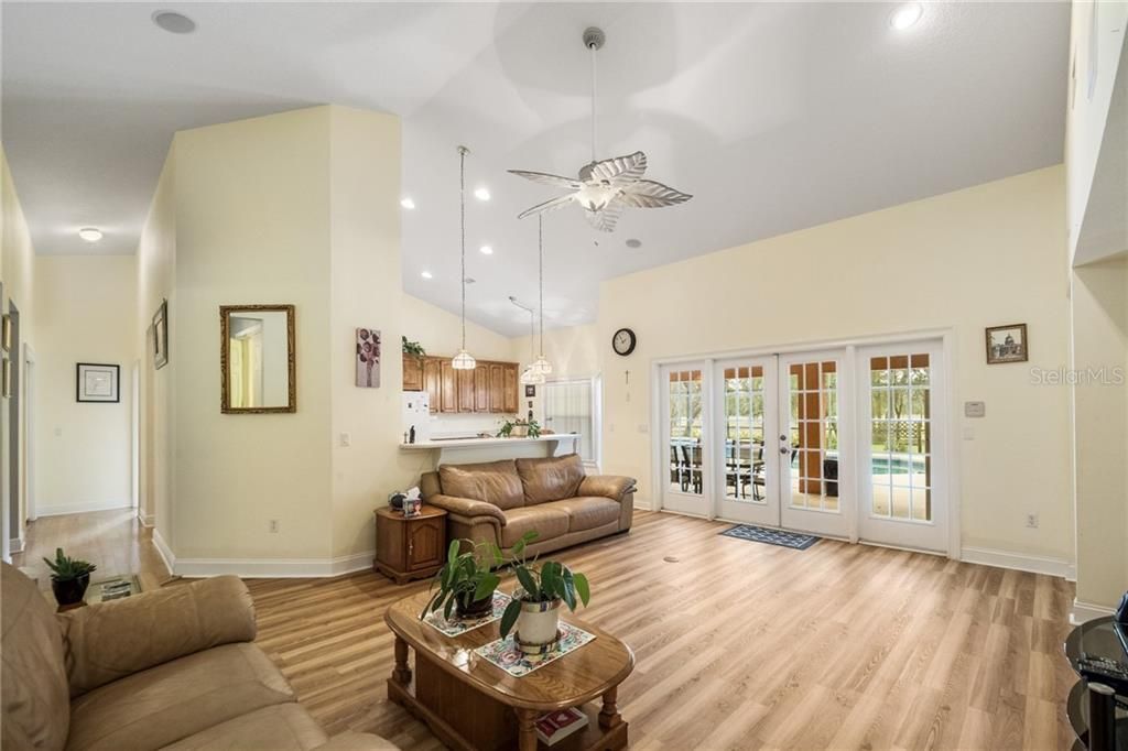 large family room with laminate flooring