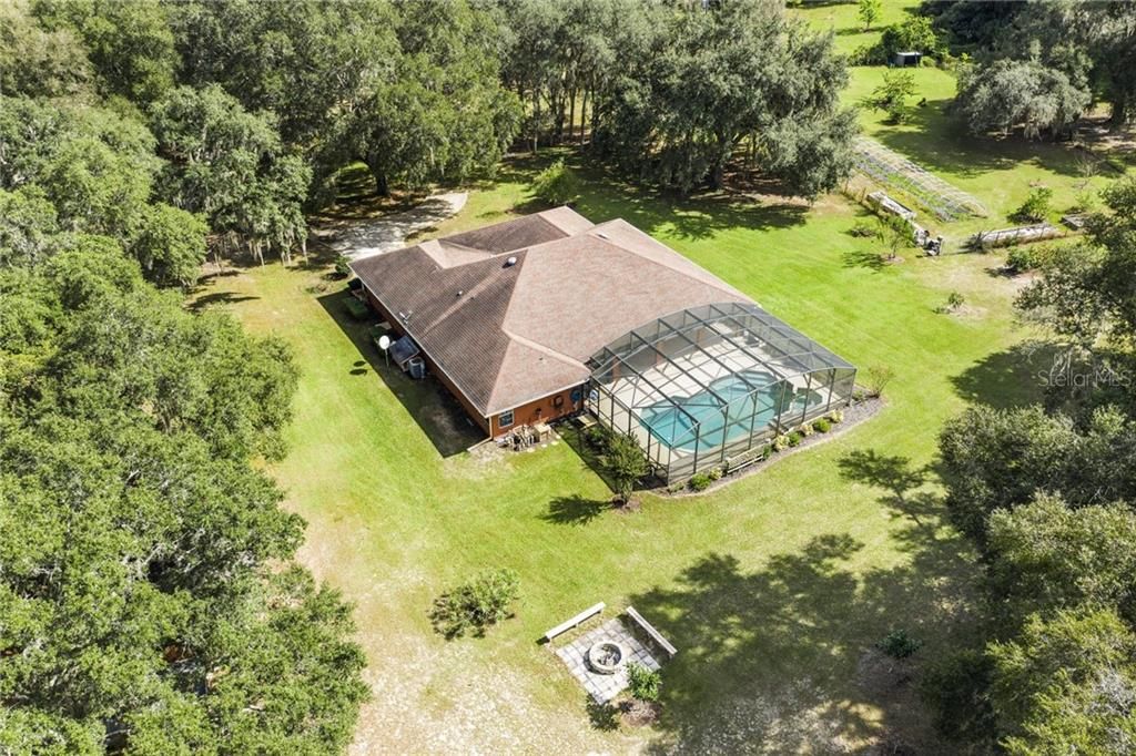 Gorgeous fenced and electric gate 4 bed 3 bath pool home on 9.61 acres! Home is turnkey with firepit, pizza oven, smoker, commercial  john deere mower and commercial well system.
