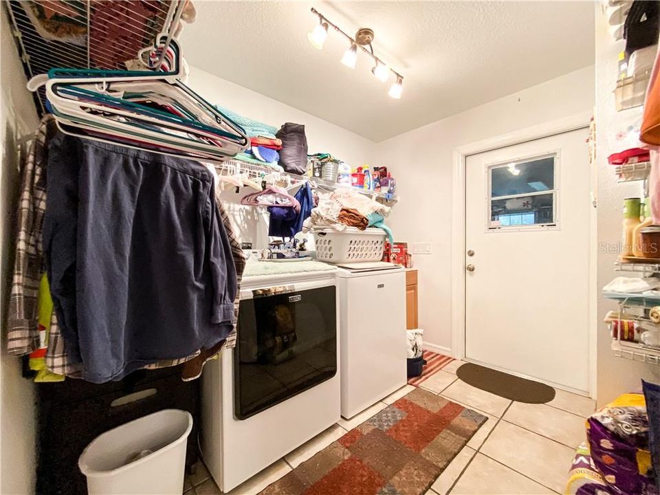 Laundry Room with Sink and Shelving