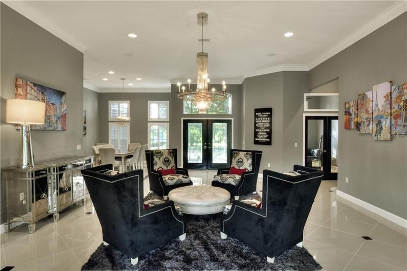 Open formal living/dining rooms designed with entertaining in mind.