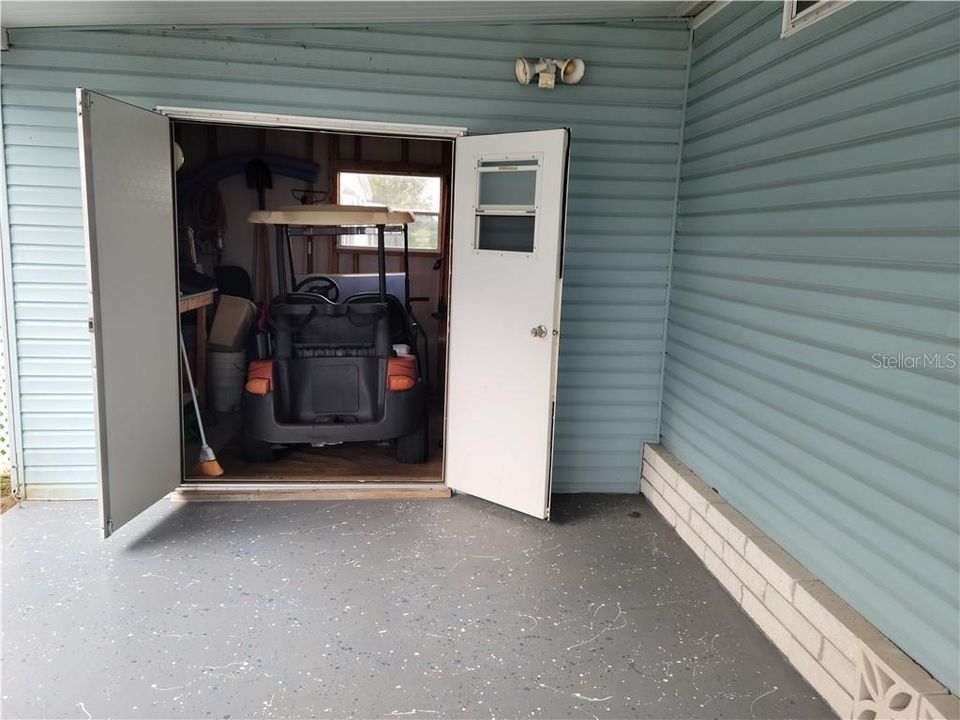 Workshop/Shed is golf car garage!