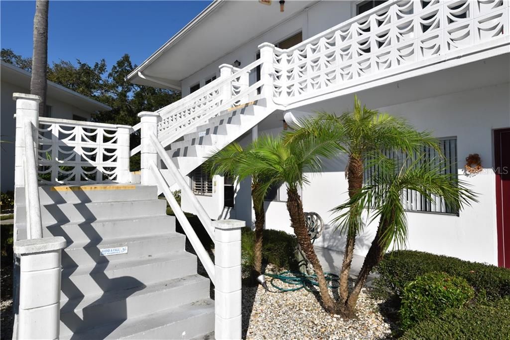 The stairs leading up to the unit.