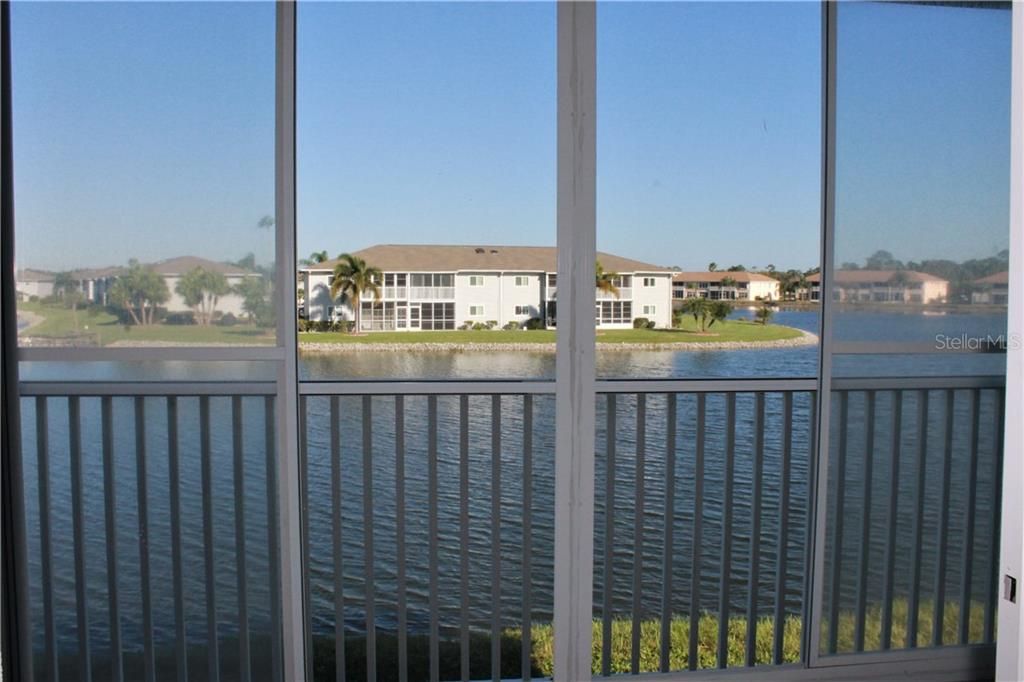 Screened, covered lanai with vinyl window sliders