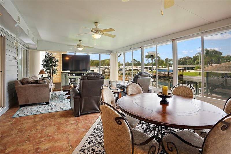 Enclosed Florida Room with A/C and Tiled Flooring and Views of the Canal