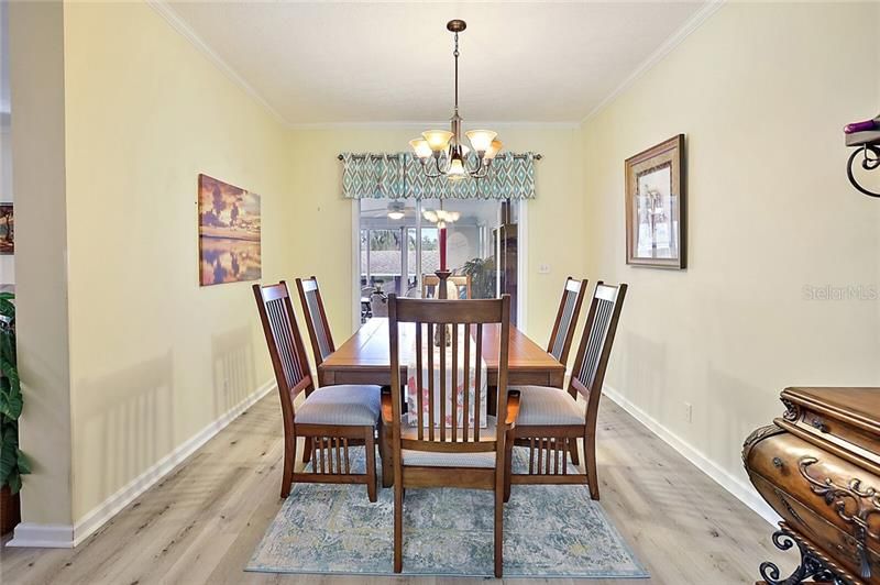 Formal Dining Room with Sliders Leading to the Florida Room