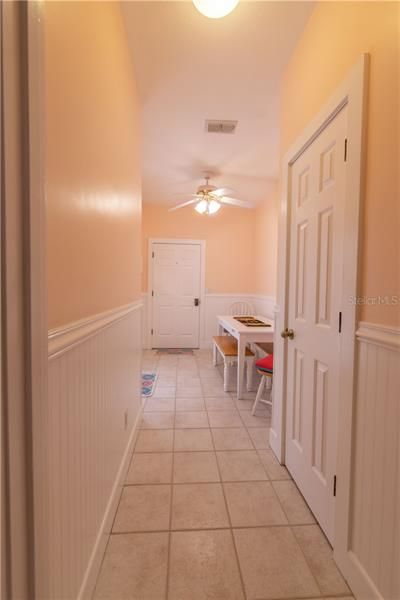 This space was originally a Laundry/Utility Room and could be returned to it's original purpose. Currently a Breakfast Nook, other potential uses include Home-Schooling Room, Craft Room, Mud Room, etc.