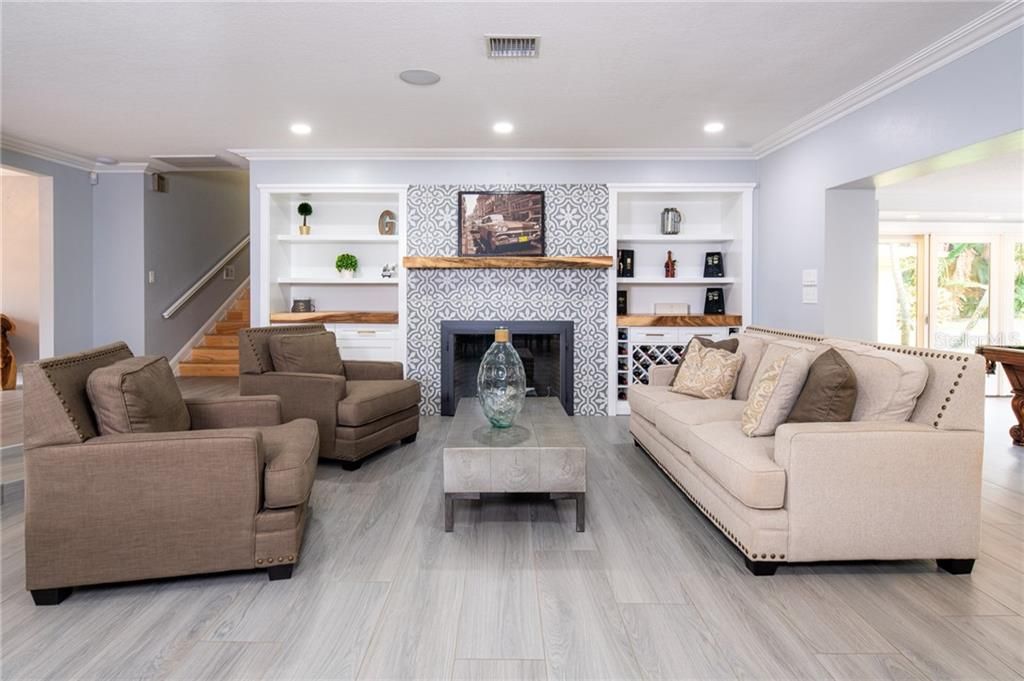 Common spaces remodeled in 2019. This photo shows the natural gas fireplace with built ins.