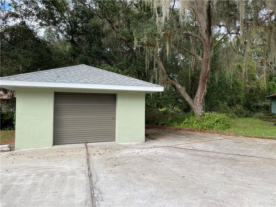 Over-sized 3rd garage... parking to the right, the property line does go past the parking pad. Beautiful lot. Friendly neighborhood.