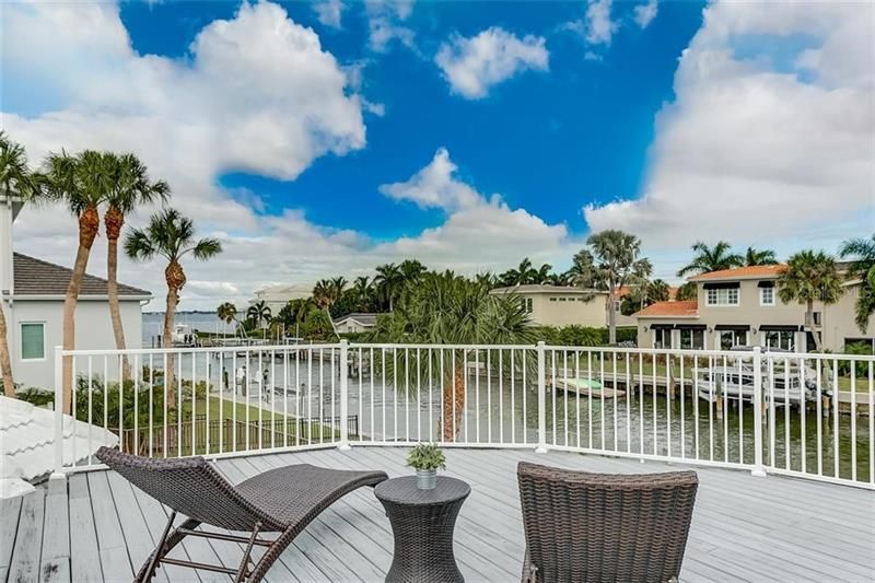 The master bedroom roof top deck offers fantastic views of the canal and Sarasota Bay.