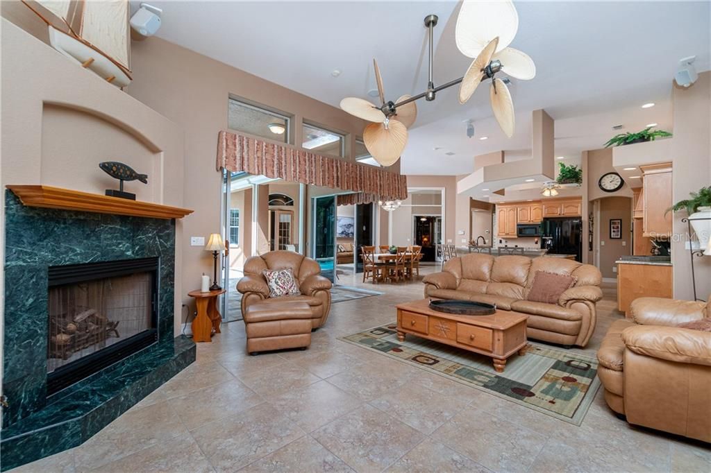 Inviting family room features gas fireplace
