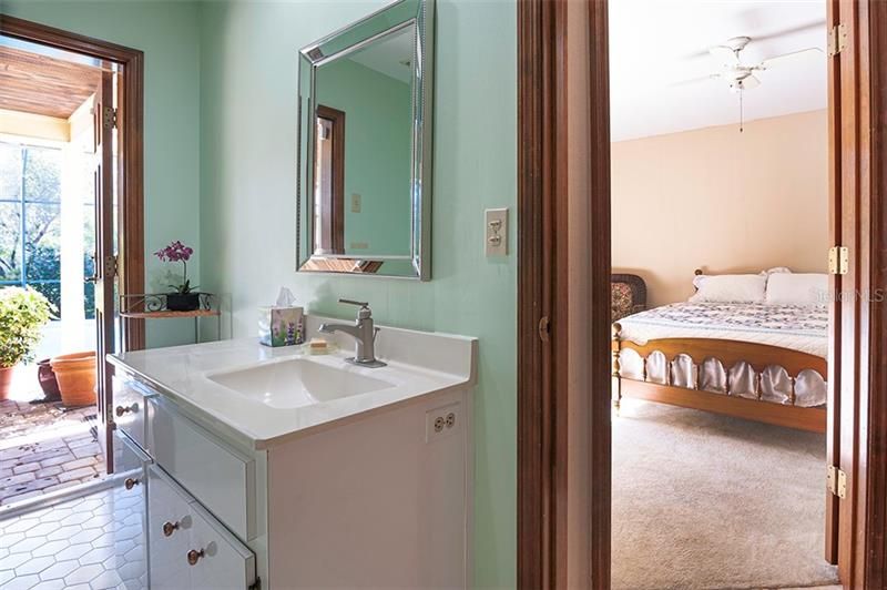 The guest bath has pool access for convenience!