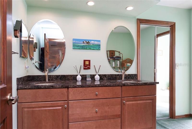 Newer cabinet, granite countertop and mirrors in the master bathroom!