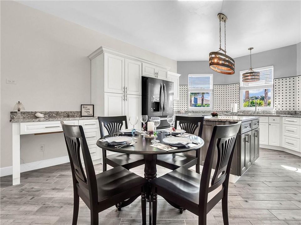 A built in desk in the kitchen.