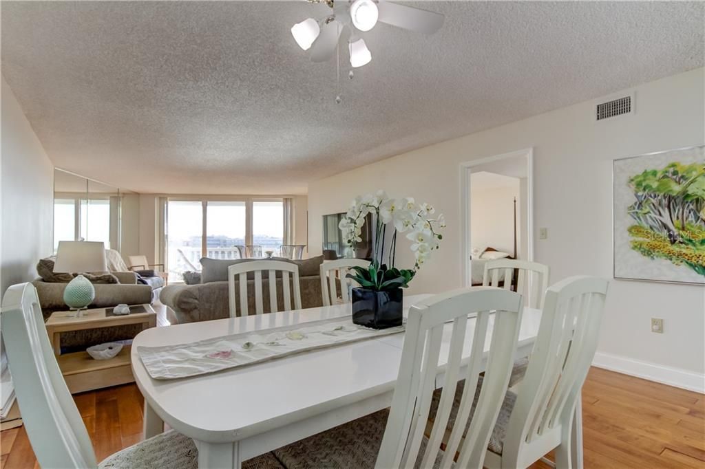 Great room has a dining area and living area.