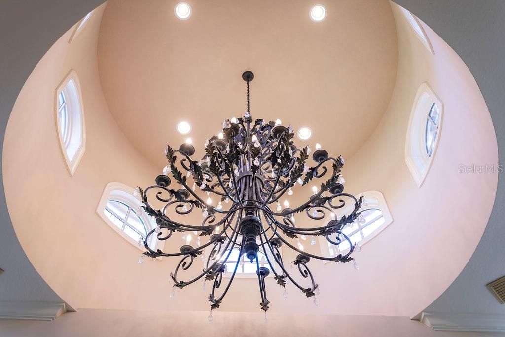 Master bath cupola ceiling detail with elegant chandelier