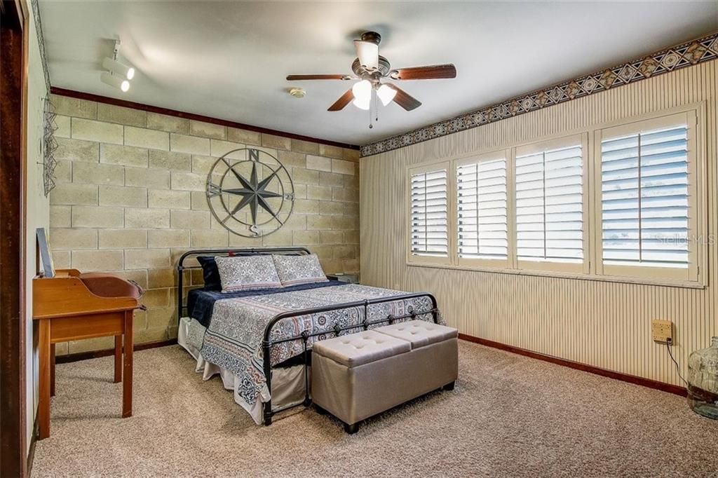 Large #2 bedroom with wood shutters and large closet