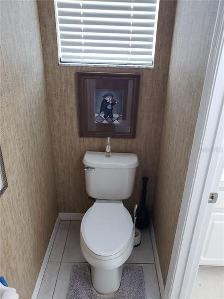 Toilet in master bathroom