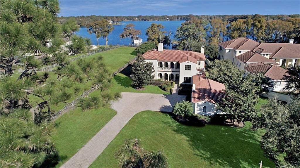 Property is surrounded by other million dollar homes on Little Lake Howell.