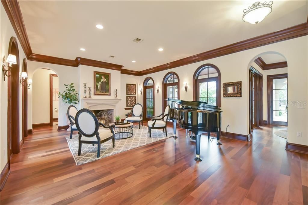 Upon entry you are greeted with tons of natural light, beautiful hard wood floors and extensive millwork and mouldings.