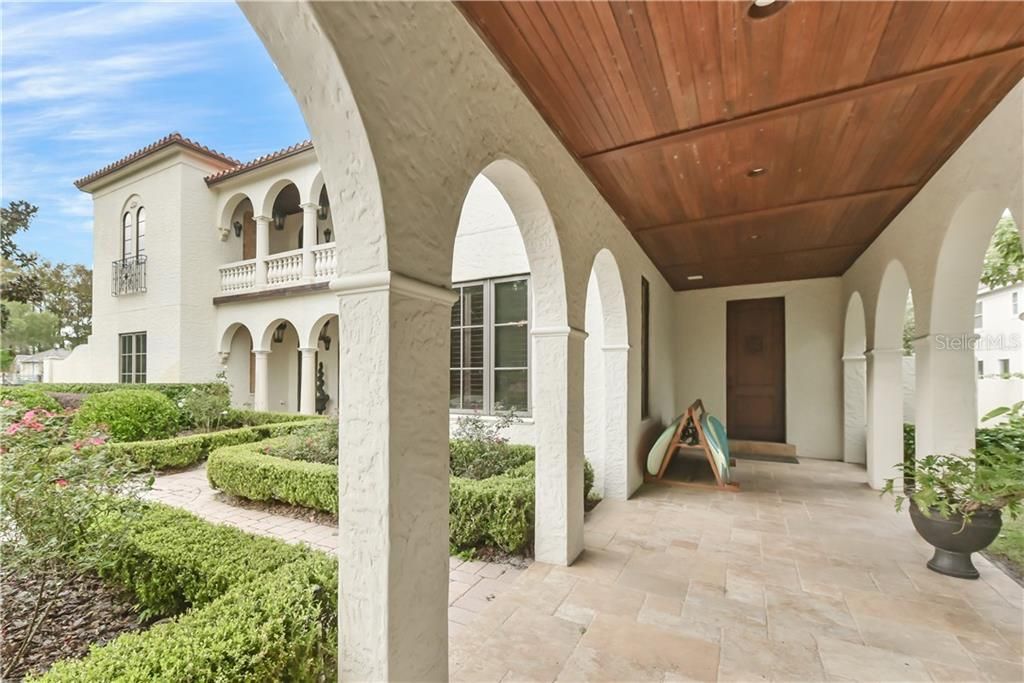 Gorgeous archways, travertine flooring and tongue and groove ceilings are just some of the incredible details that highlight this home.