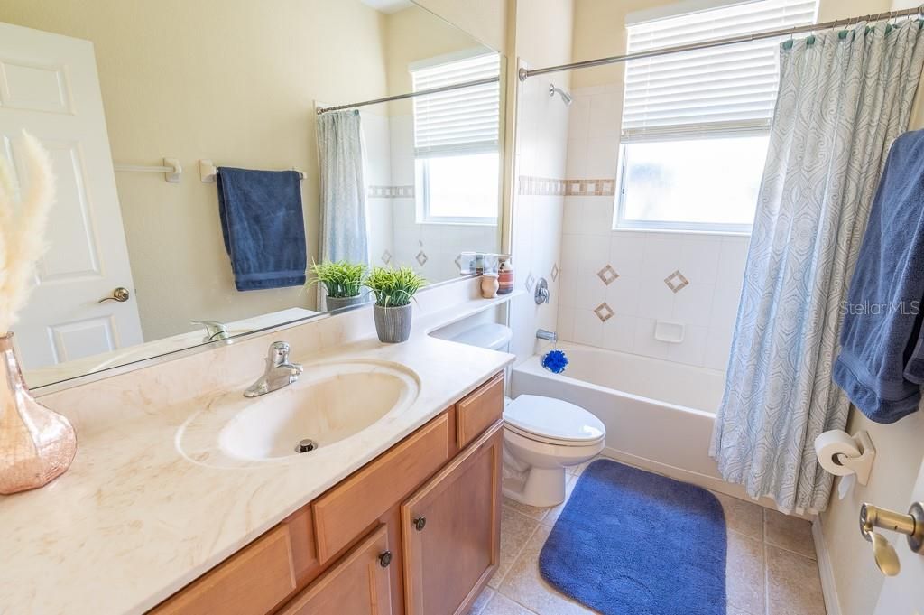 Full Bathroom with spacious counter.