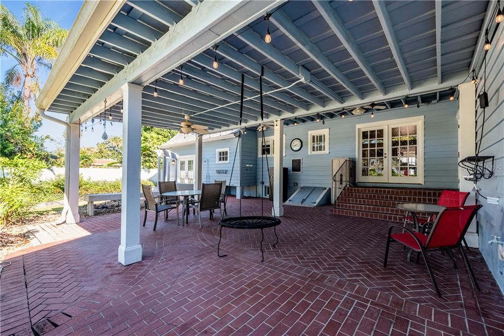 Several French Door access points lead you outside to the OVERESIZED COVERED PATIO that is an amazing space to entertain friends and have year round barbecues!