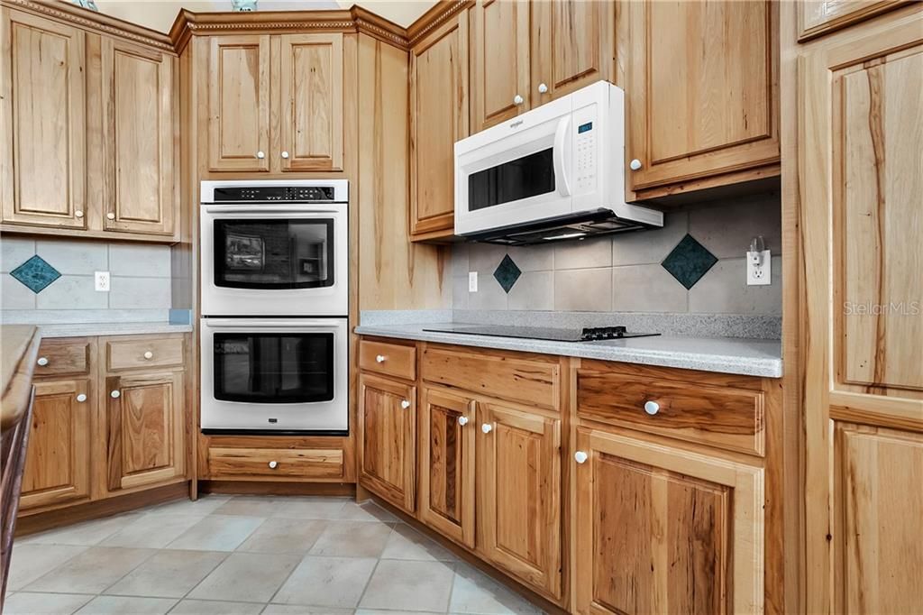 The is an abundance of cabinet space in the kitchen.