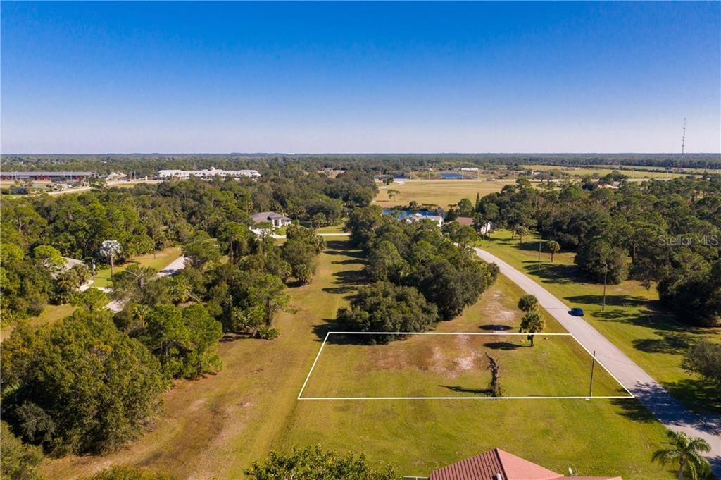 Fabulous lot in deed-restricted Burnt Store Lakes in Punta Gorda - notice the greenbelt that separates the lot from lot on the other side