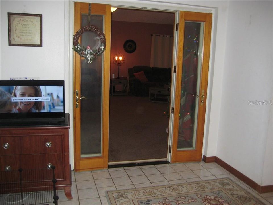 Office showing entrance into living room.