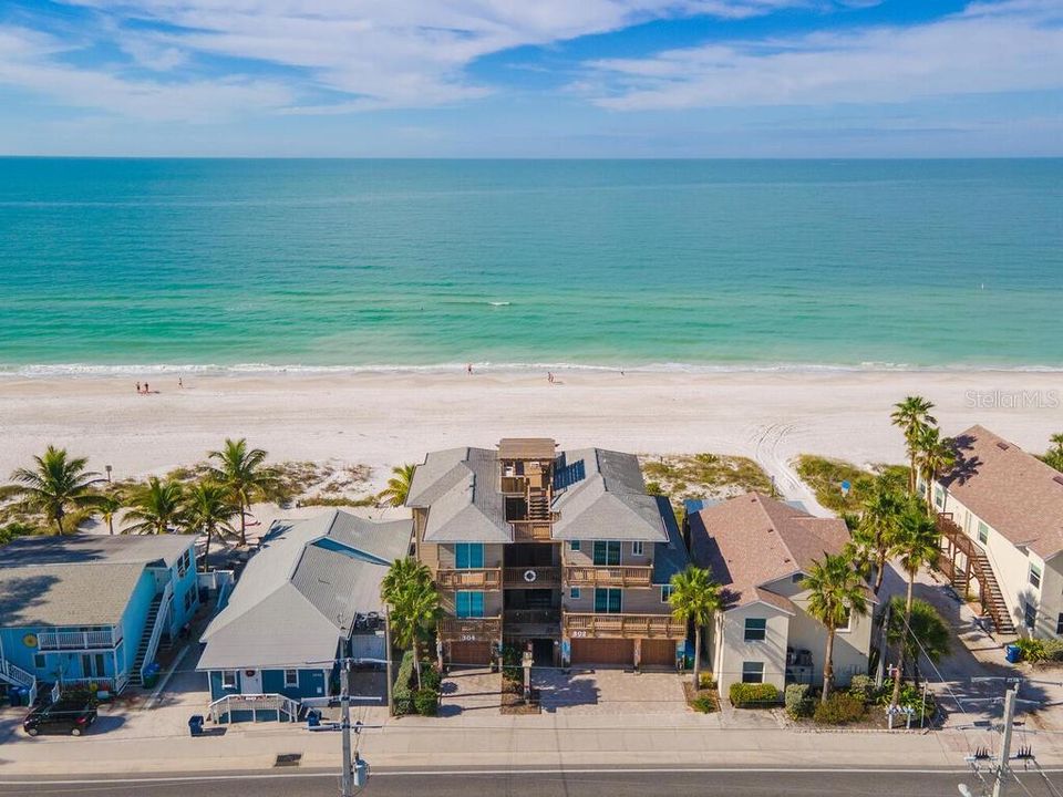 What an amazing location! Directly on the sand in the heart of Bradenton Beach, welcome to Linger Longer. Currently a multi-family 4 unit property but zoned for 3-9 units.