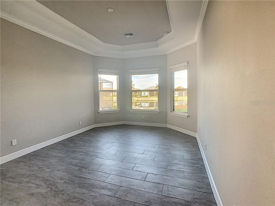 Master suite, plank tile floors.