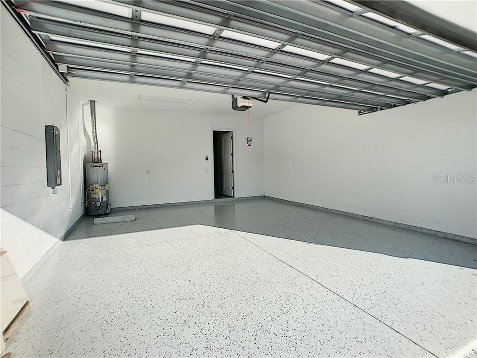 Extended 2 car garage w/epoxy finish.