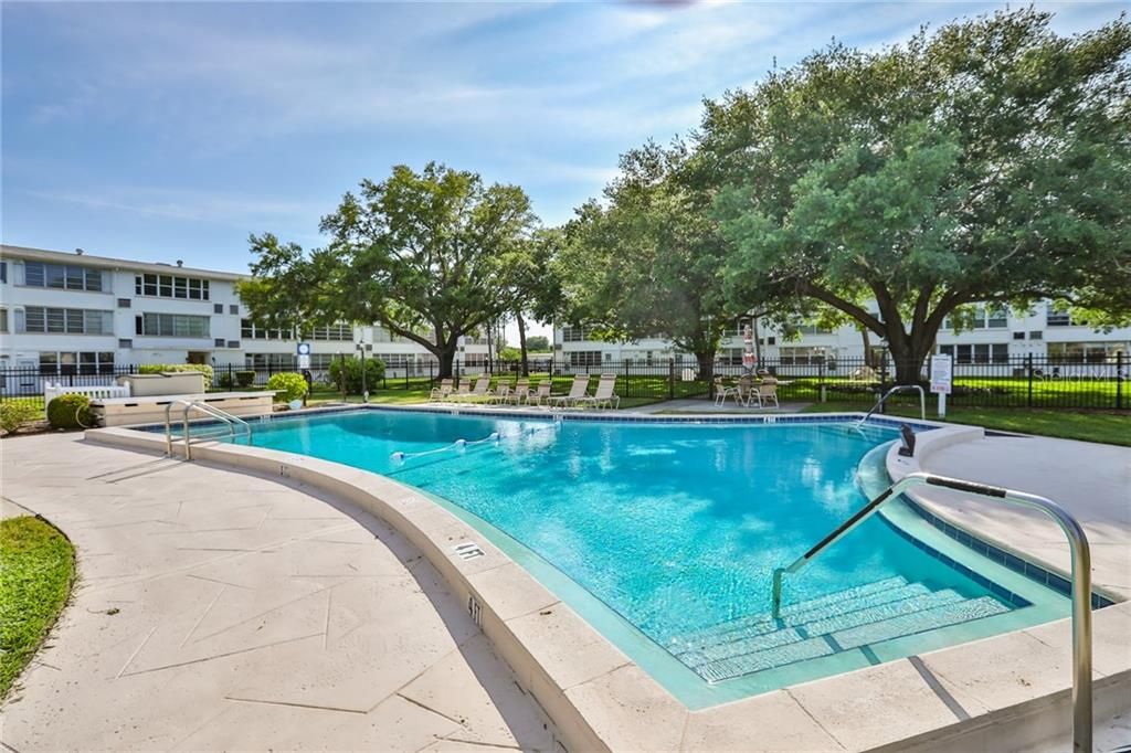 Heated community pool in the middle of the beautiful landscaped courtyard