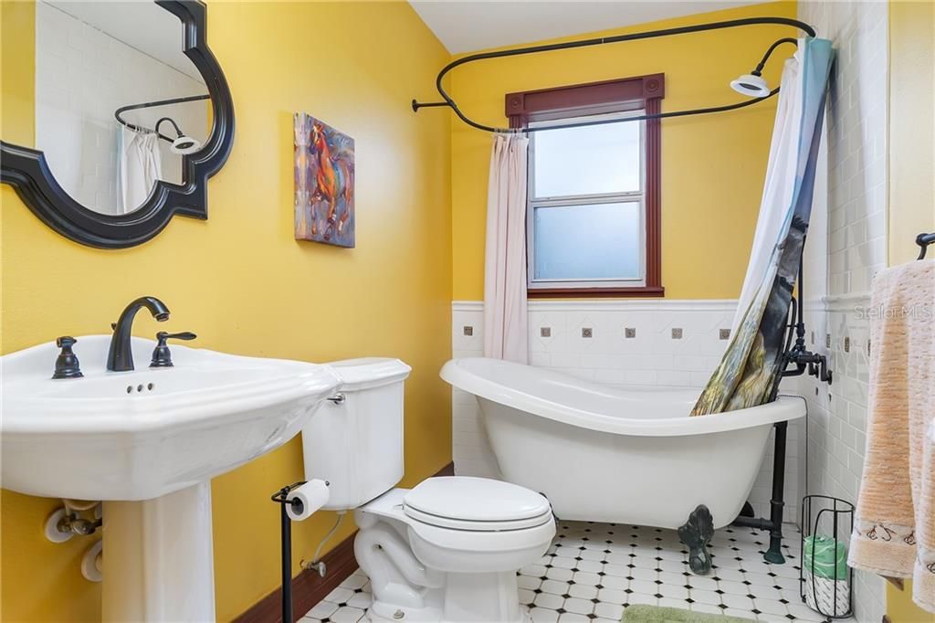 Charming 3rd bath with Clawfoot tub & shower attachment.  Classic look.