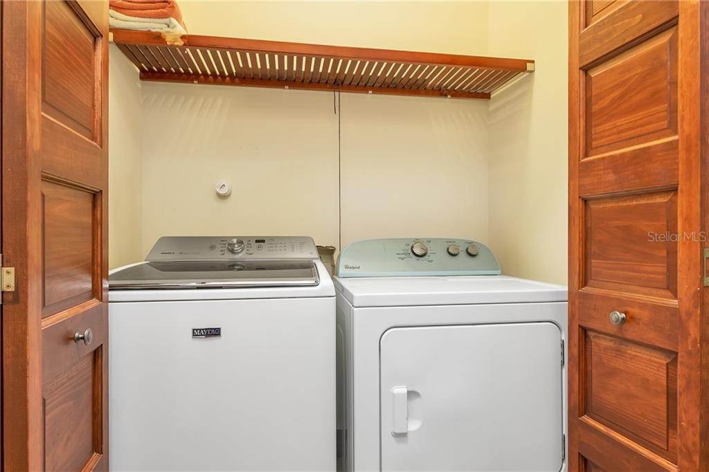 Laundry closet across from pantry.