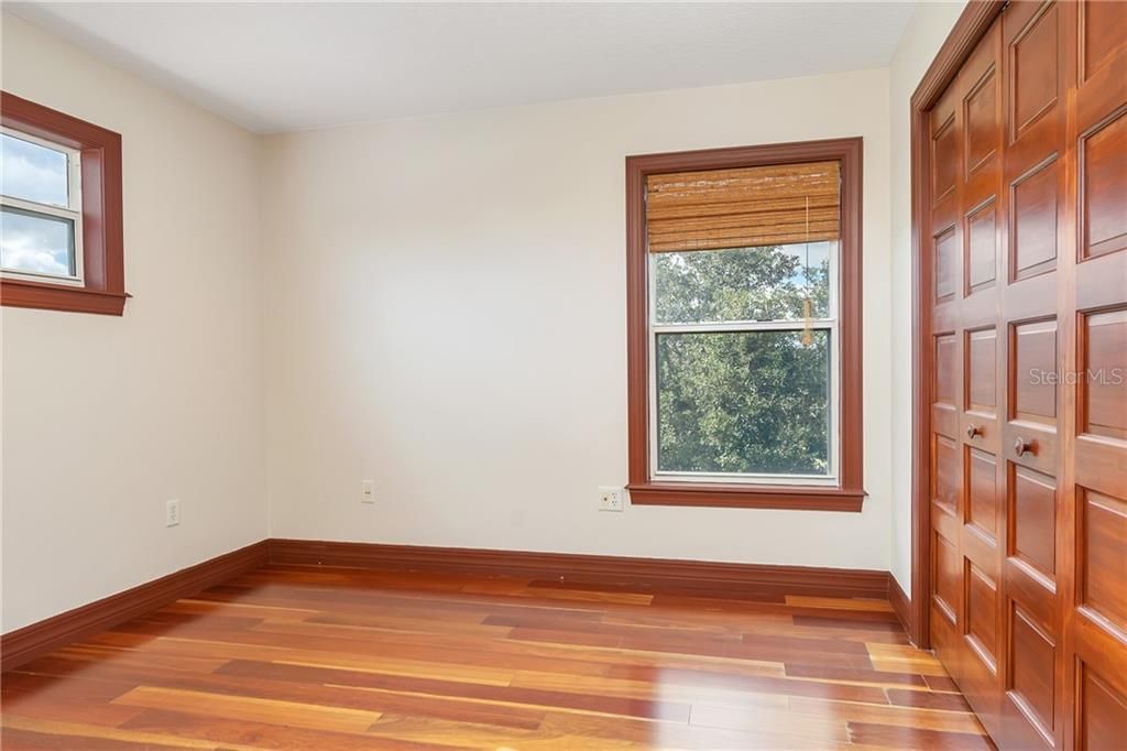 Look at that wood!  Gleaming. Bedroom 3