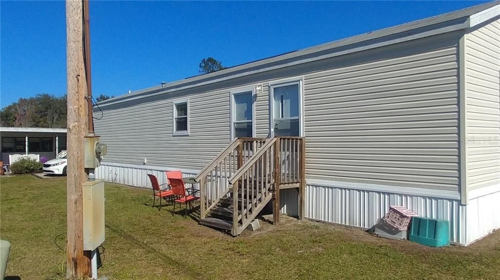rear of mobile home, room for carport or screened porch