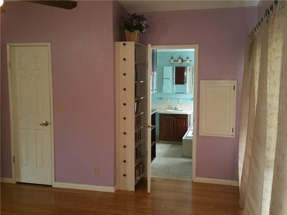 Master bathroom has two vanities and separate whirlpool tub and walk in shower.