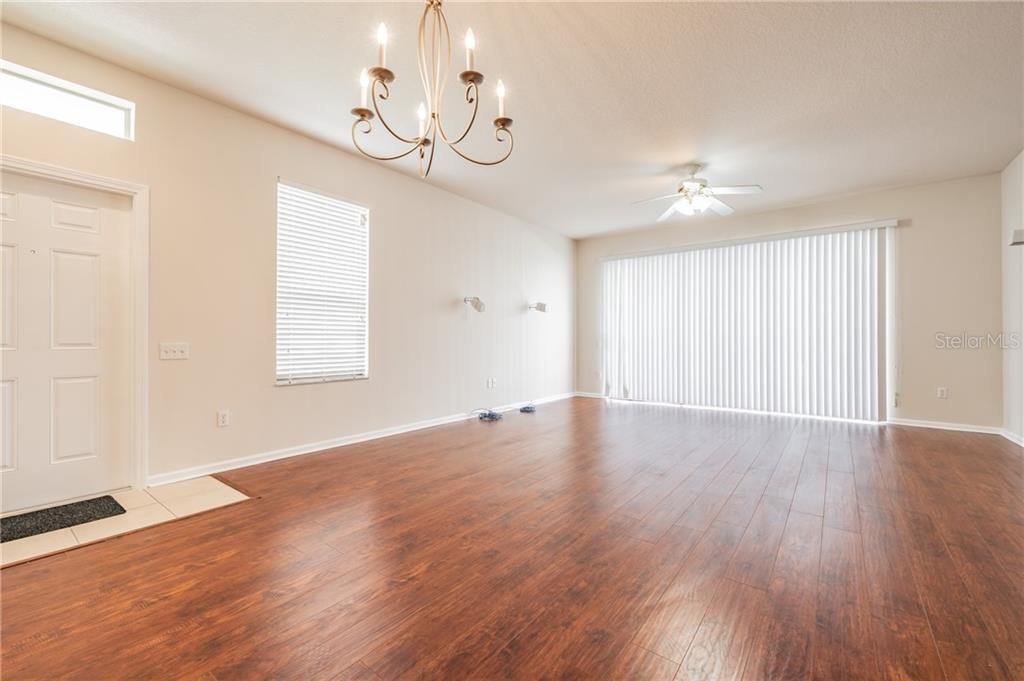 Beautiful wood-look laminate flooring & fresh interior paint welcome you into the very large & open floorplan.