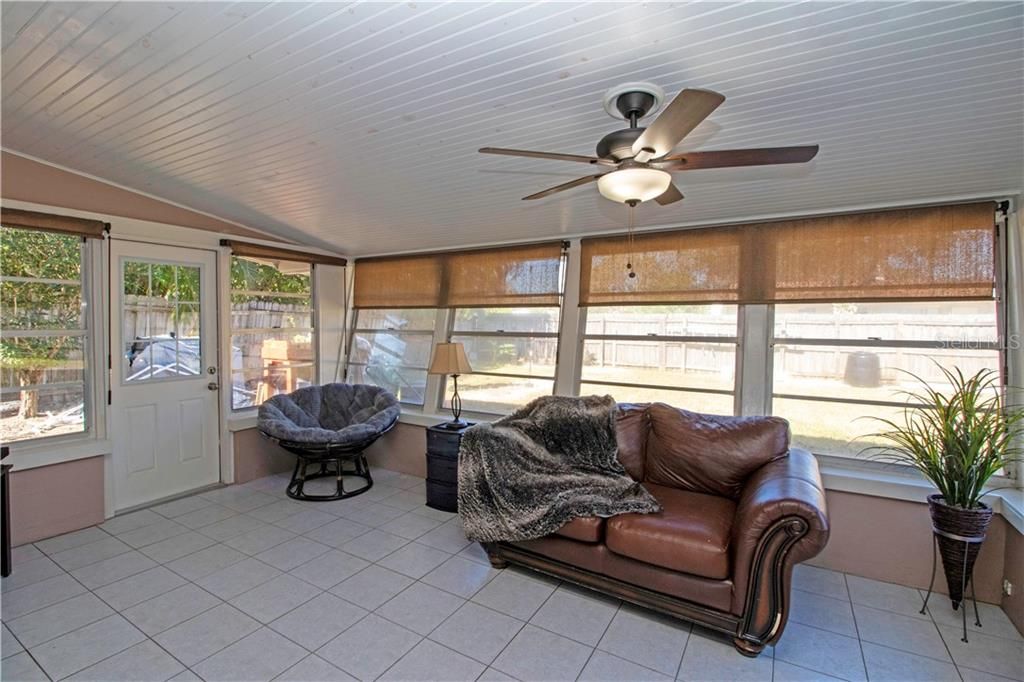 Enclosed porch.  Makes a great flex area for any need your family has.
