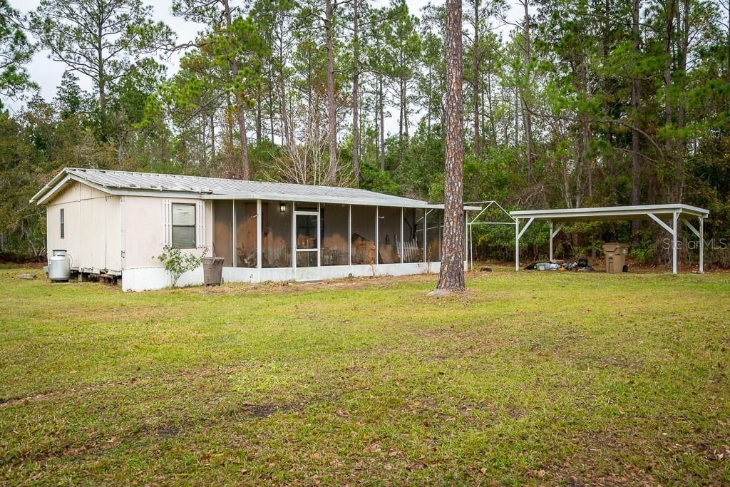 Home #2: 2/2 home with large screened porch. This home needs TLC.
