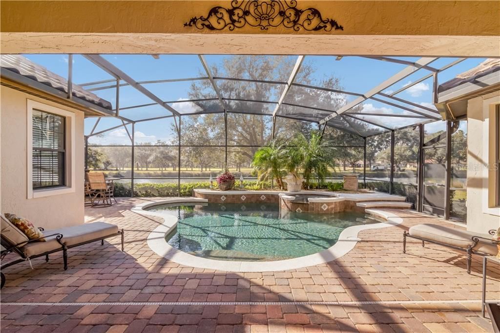 Enjoy relaxing as you enjoy the beautiful views of the pool/pond & golf course.
