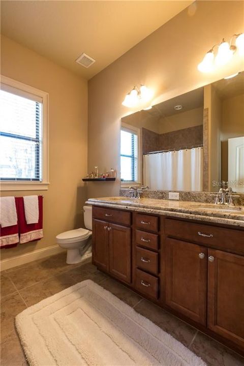 2nd bath with Italian Granite countertops, double sinks, Shower/Tub.